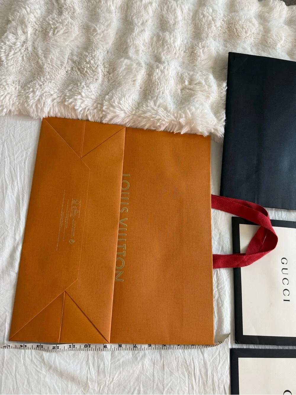 Lot of Designer gift bags: LV limited edition, two Gucci and one YSL